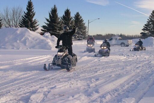 Snowmobilers out for a ride.